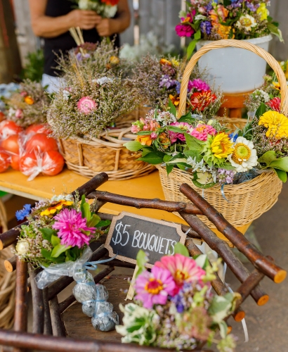 Outdoor farmers market in Charlottetown, Prince Edward Island, with local vendors, fresh produce, and handmade goods