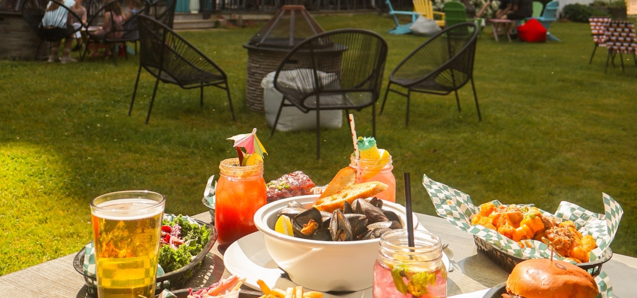 Freshly prepared dishes served on the outdoor patio at Brakish restaurant in Charlottetown, Prince Edward Island.