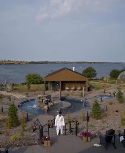 Outdoor Nordic spa pools and saunas at Mysa Nordic Spa in Prince Edward Island, relaxing wellness destination ideal for a rainy day escape