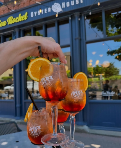 A stacked Aperol Spritz cocktail tower served at Sea Rocket restaurant in Charlottetown, Prince Edward Island.