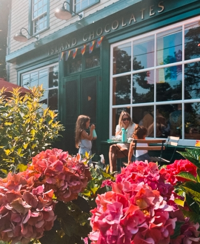 Colourful seaside village of Victoria-by-the-Sea in Prince Edward Island with waterfront views, small shops, and a peaceful harbour.