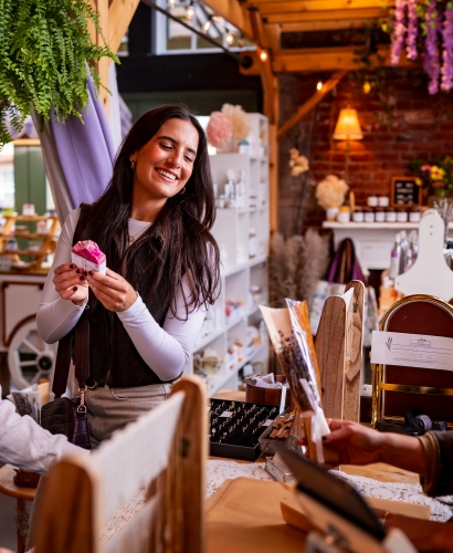 Shoppers browsing local vendors inside Founders’ Food Hall & Market in downtown Charlottetown, Prince Edward Island.