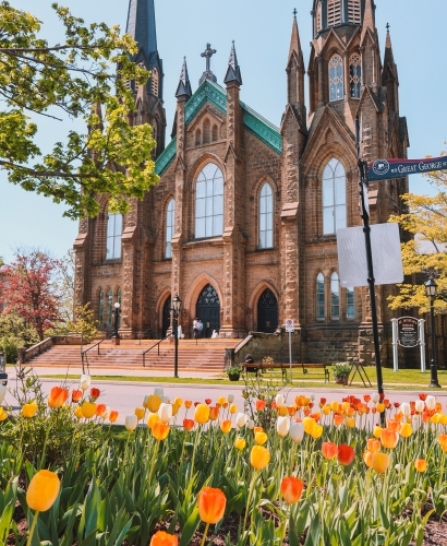 St. Dunstan’s Basilica, a historic Gothic Revival church located in downtown Charlottetown, Prince Edward Island, viewed on a sunny day.