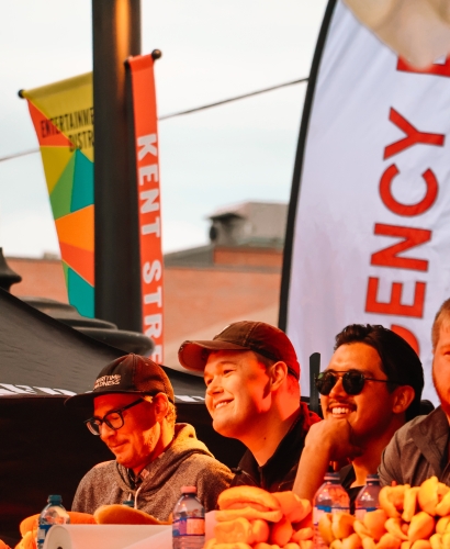 Hot dog eating contest at a street feast in Charlottetown, Prince Edward Island